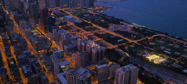 High angle view of city lit up at night,tokyo- japan