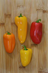 Close-up of yellow bell peppers on table