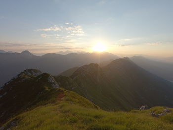 Scenic view of mountains against sky during sunset
