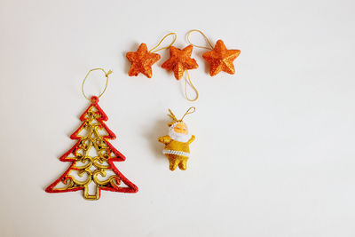 High angle view of christmas decorations on white background