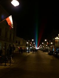 Illuminated street lights at night