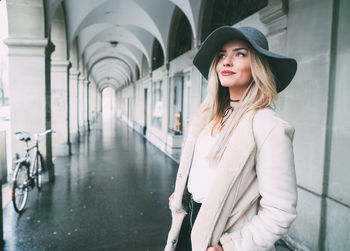 Portrait of woman in corridor