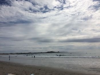 Scenic view of sea against cloudy sky