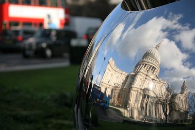 St paul cathedral reflecting on traffic mirror
