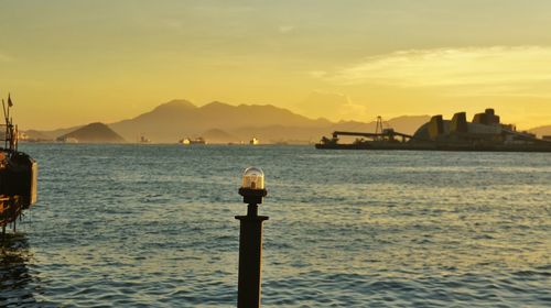 Scenic view of sea against sky at sunset