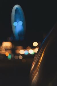Defocused image of illuminated lights at night