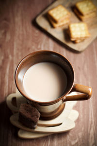 High angle view of coffee cup on table