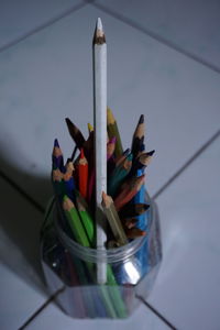 High angle view of colored pencils on table