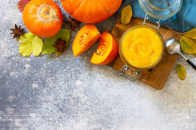 High angle view of orange fruits on table
