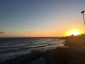Scenic view of sea against sky during sunset