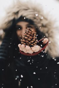 High angle view of hand holding ice cream