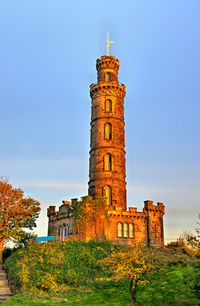 Low angle view of historical building against clear blue sky