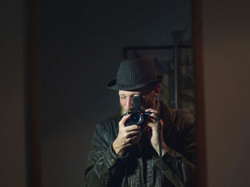 Man photographing with camera