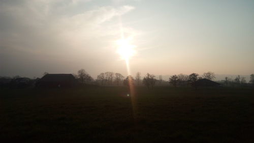 Scenic view of landscape at sunset