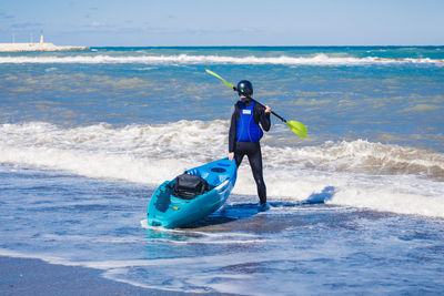 Man surfing in sea