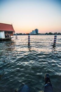 Scenic view of sea against clear sky during sunset