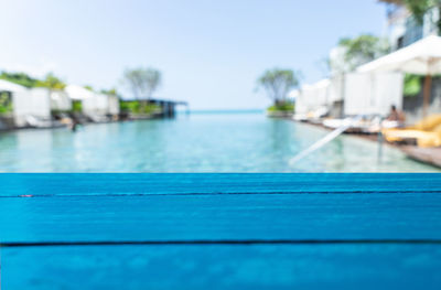 Close-up of swimming pool against sea