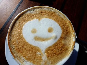 Close-up of froth art on coffee
