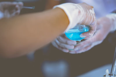 Close-up of hand holding ice cream