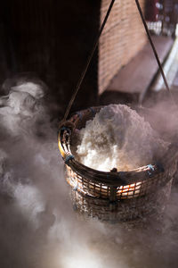 Close-up of ice cream hanging on wicker basket