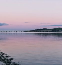 Scenic view of sea against sky at sunset