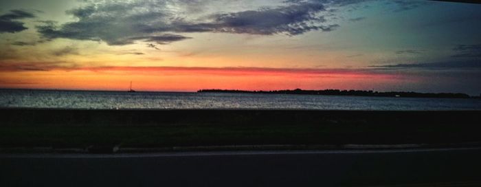 Scenic view of sea at sunset