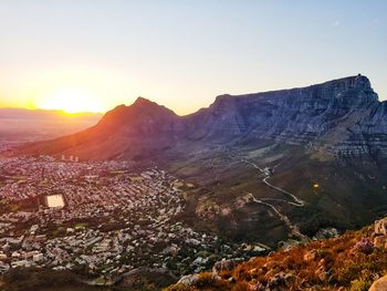 Scenic view of mountains against sky during sunset