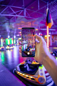 Close-up of hand using mobile phone