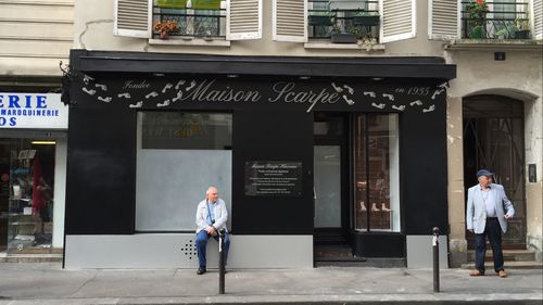 Full length of man standing on wall