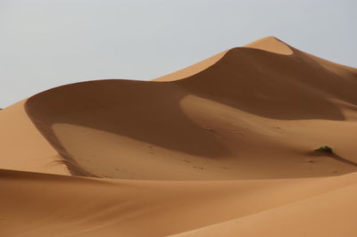 Scenic view of desert against sky