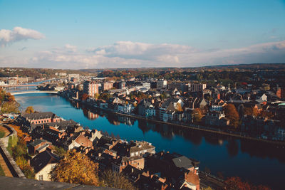 High angle view of river against sky in city