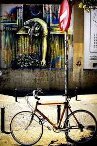 Bicycle parked in front of building