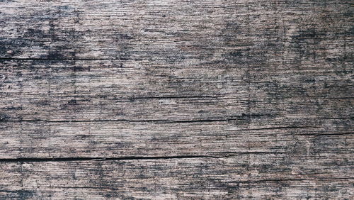 Full frame shot of weathered wooden plank