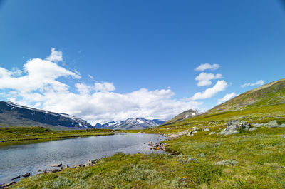 A beautiful small mountain lake in sarek national park, sweden during august. 