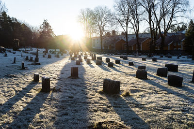 View of cemetery against sky during winter