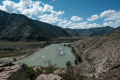 Panoramic view of landscape and mountains against sky