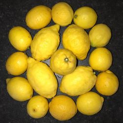 Close-up of oranges and yellow fruits