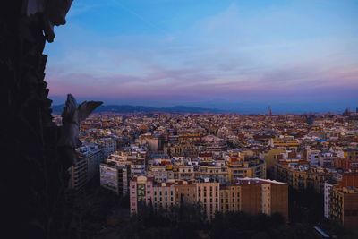 Cityscape against sky during sunset