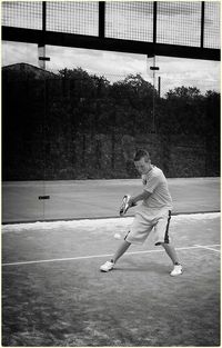 Full length of man playing with ball