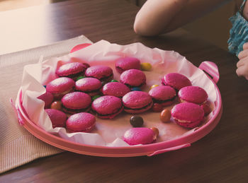 High angle view of strawberries in plate on table