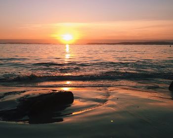 Scenic view of sea at sunset