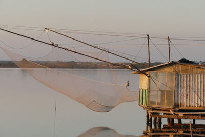 View of fishing net against clear sky