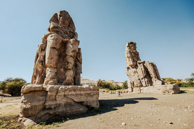 View of rock formations against clear sky