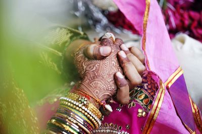 Close-up of woman holding hands