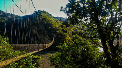 Scenic view of suspension bridge against sky