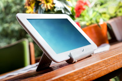 Close-up of mobile phone on table