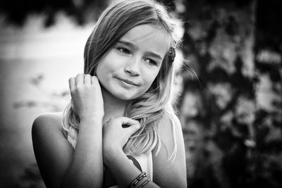 Portrait of beautiful woman standing outdoors