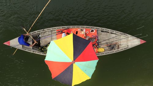 High angle view of boat floating on lake