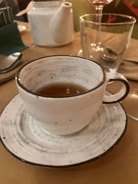 Close-up of coffee cup on table