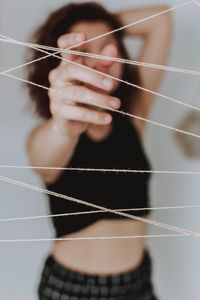 Close-up of woman holding leaf